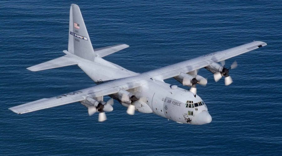 A C-130E from the 2nd Airlift Squadron, Pope AFB, N.C., flies over the Atlantic Ocean along the North Carolina coast. The C-130 Hercules primarily performs the intratheater portion of the airlift mission. The aircraft is capable of operating from rough, dirt strips and is the prime transport for paradropping troops and equipment into hostile areas. (U.S. Air Force photo by Tech. Sgt. Howard Blair)